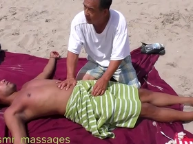 Nipple & penis massage on a public beach